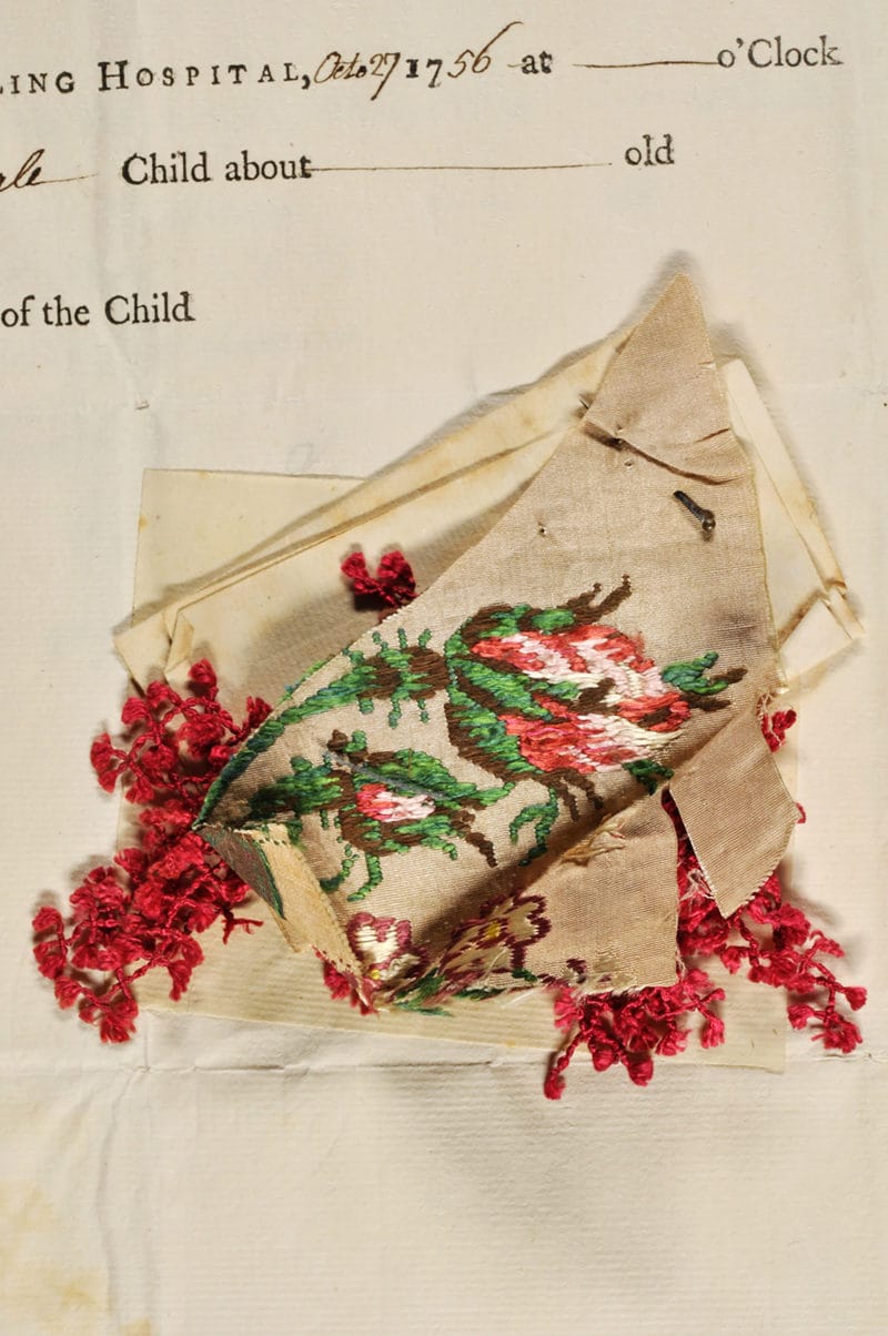 An expensive flowered dress silk of about 1750, with a matching piece of fly braid. Foundling number 2584. A girl, admitted 27 October 1756. Named Sarah Barber by the Foundling Hospital. Died 17 March 1761 © Coram