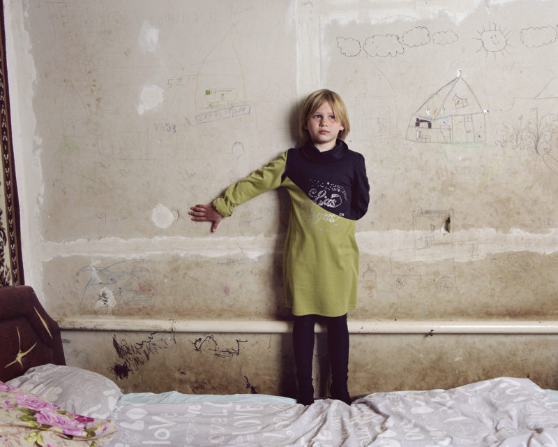 Nadya, Bylbasivka, 2019, in Western Donetsk.   "Having visited Donbas many times, what stands out for me are the recurring threats, that continue to make the lives of normal people in the region precarious, both during times of war and peace. Mental health issues amongst the population of Donbas region have risen exponentially due to the incredible stress and pressure of living on the frontline of a war for nearly eight years (at the time of writing). This will cause lasting damage."