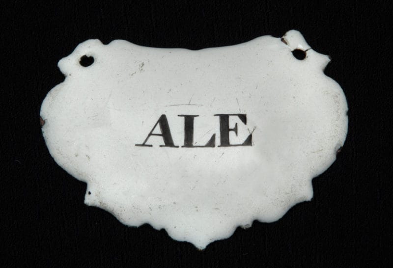 Token: Enamel ‘ALE’ label