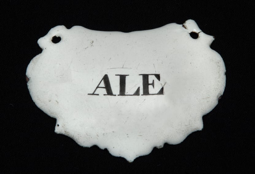 Token: Enamel ‘ALE’ label