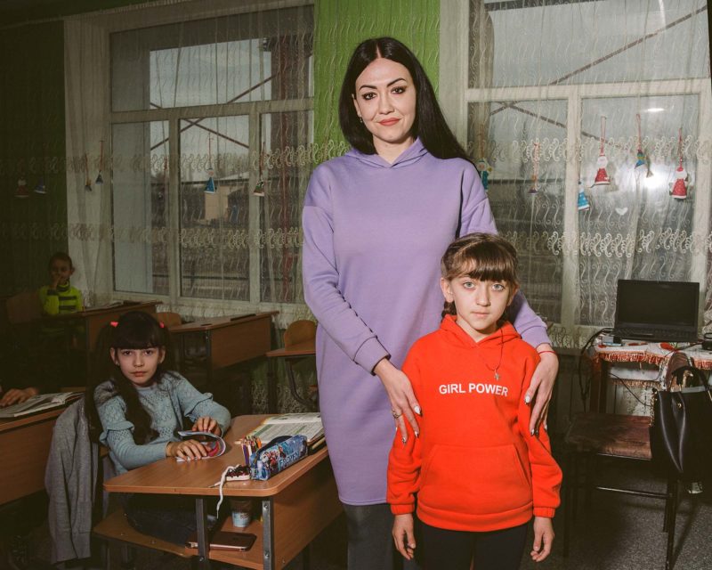 Khristina Ovcharenko, a third-grade teacher, in her classroom in Stanytsia Luhanska, in early February 2022. She left the area on February 17th, hours after a nearby kindergarten building was shelled. Ovcharenko, who has been a teacher for eleven years, said that children who are old enough to remember the start of the separatist rebellion “stand out—they’re more anxious, less calm.”