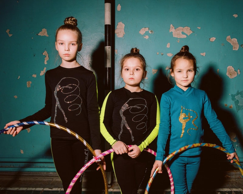 Nastya, Masha, and Yana at an athletic center in Stanytsia Luhanska, where children take free gymnastics lessons. “There’s never enough time,” Tatiana Kopanaiko, an instructor, said. “I wish I could give every child some personal attention.” As fighting intensified before the Russian invasion, she continued holding practices: “We had some shelling recently, after lunch, but when we put the music on you can’t hear a thing.”