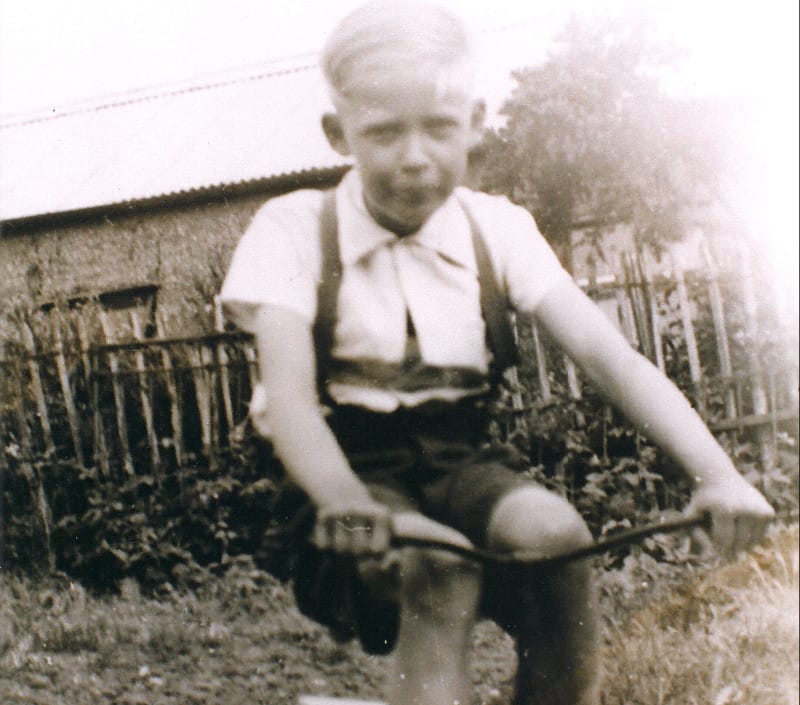 Mark in his foster family's garden