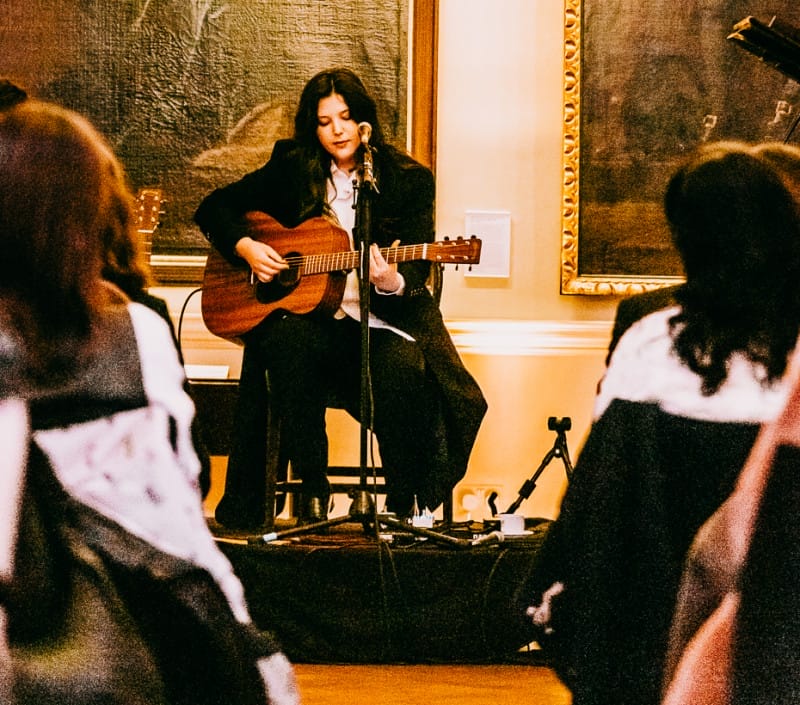 Lucy Dacus performing in the Picture Gallery. Photograph Ashley Gellman